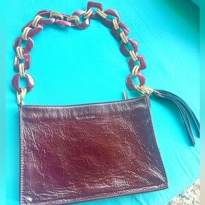 NWOT! Patent crinkle leather bag with decorative acrylic strap from Kelly Tooke